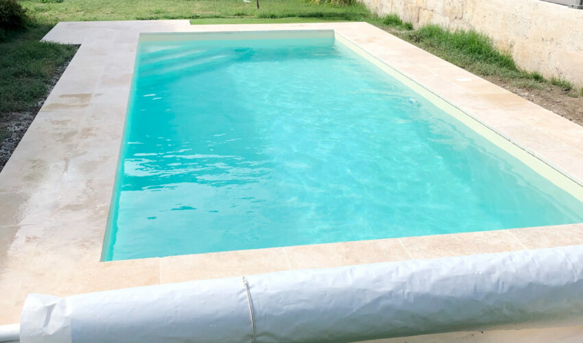 Construction of a swimming pool and tarpaulin by Piscines ANCA