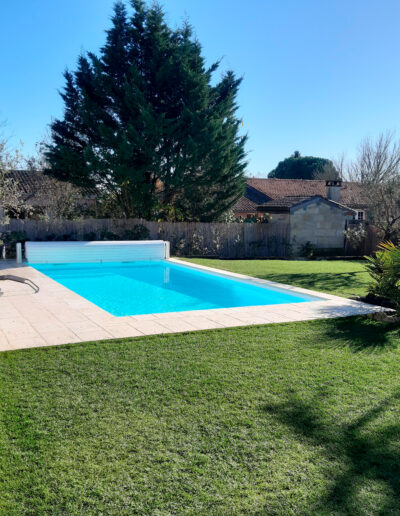 Construction of a swimming pool with shutter by Piscines ANCA