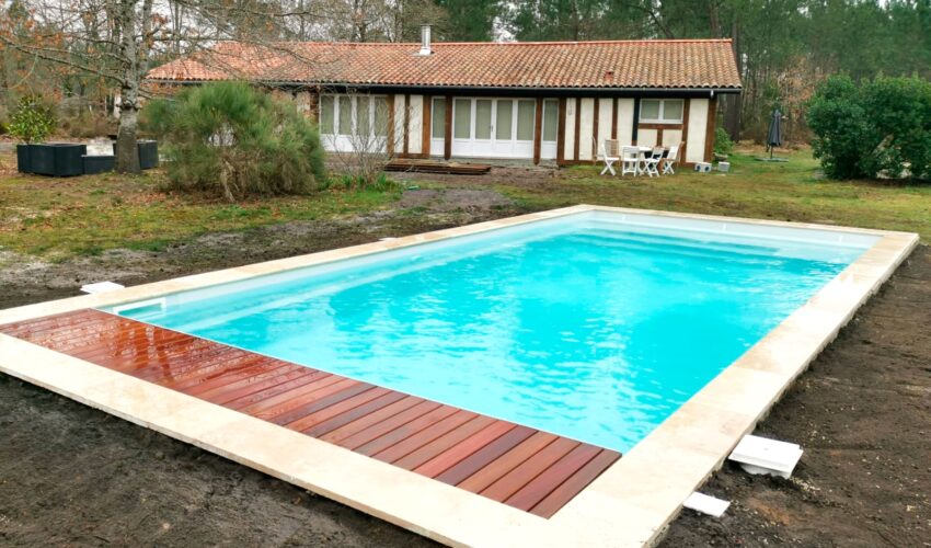 Réalisation d'une piscine maçonnée avec cailleboti par Piscines Anca