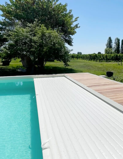 Construction d'une piscine avec volet immergé par Piscines Anca